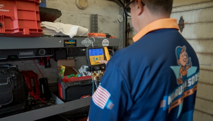 Back Shot Of Technician Preparing Tools