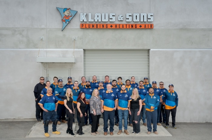 Klalus And Sons Group Photo Infront Of Building