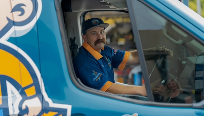 Technician Driving Truck